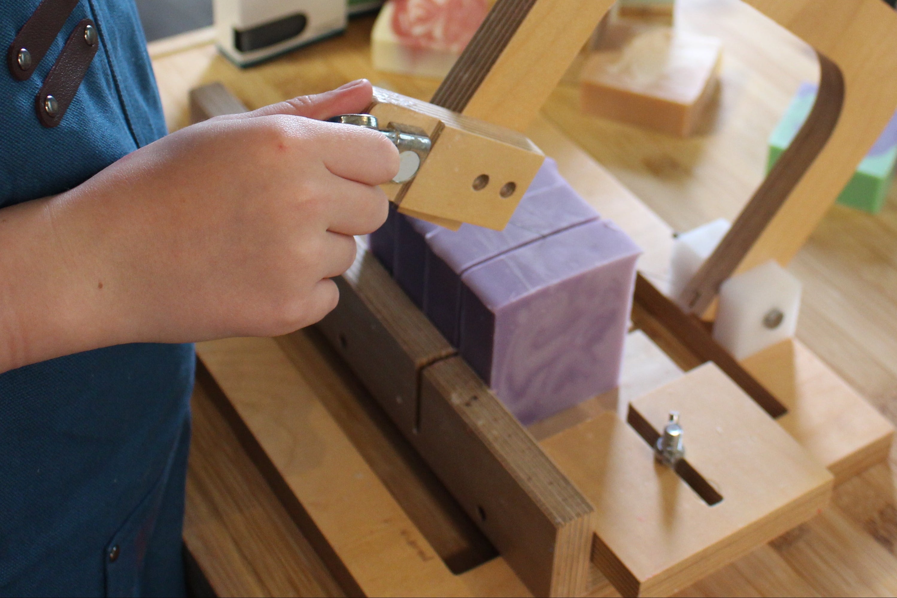 Maddie cutting soap